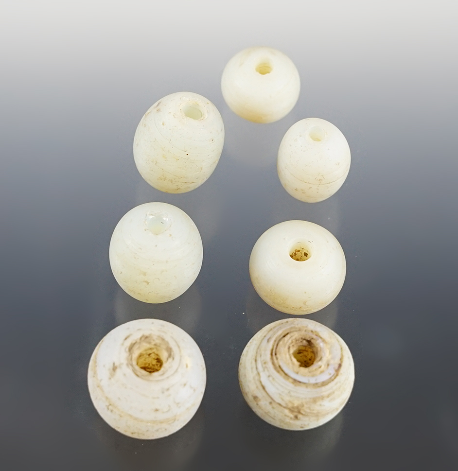 Set of 7 Opal Wire Wound Beads found at the Townley-Read Site, Geneva, New York. 