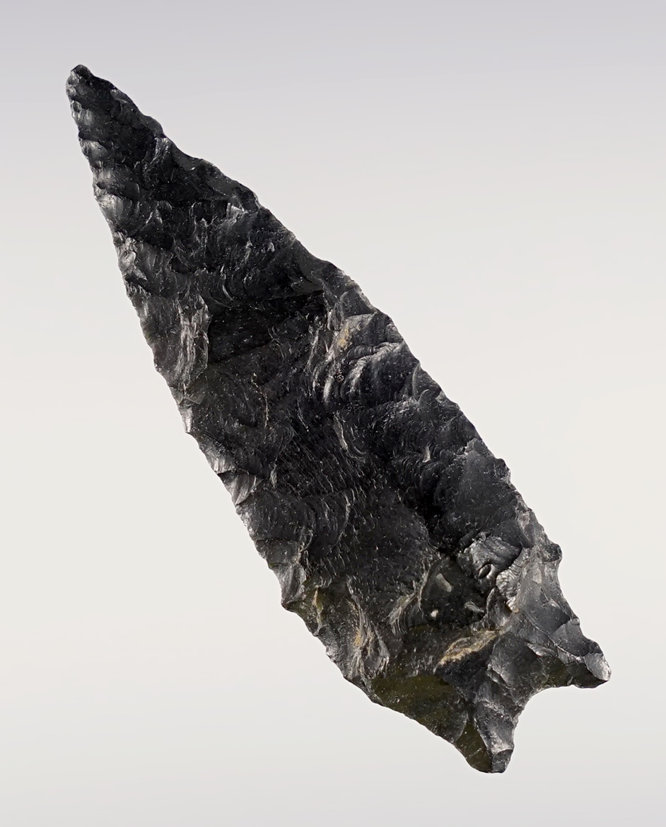 2 5/16" Pinto Basin found in Southern Oregon in the 1960's. Nicely made from patinated Obsidian.