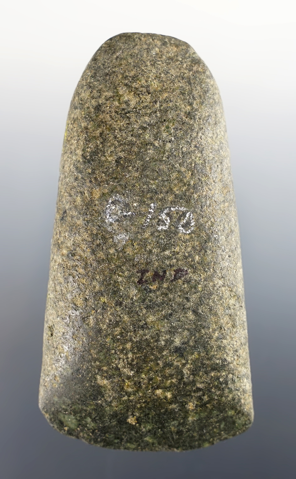 3 7/8" Hardstone Celt found in Indiana. Good overall condition. Ex. Largen, Irvin Dougherty.