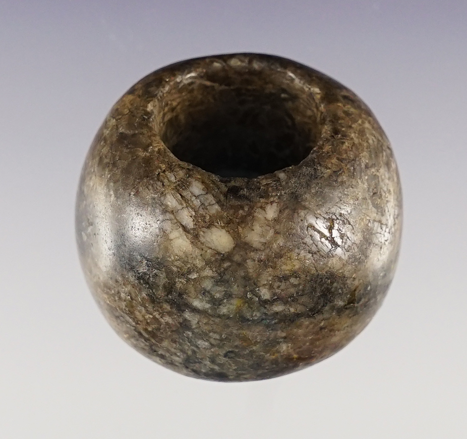 1 1/16" large Bead or small Bannerstone made from Hardstone. Found in Belmont Co., Ohio.
