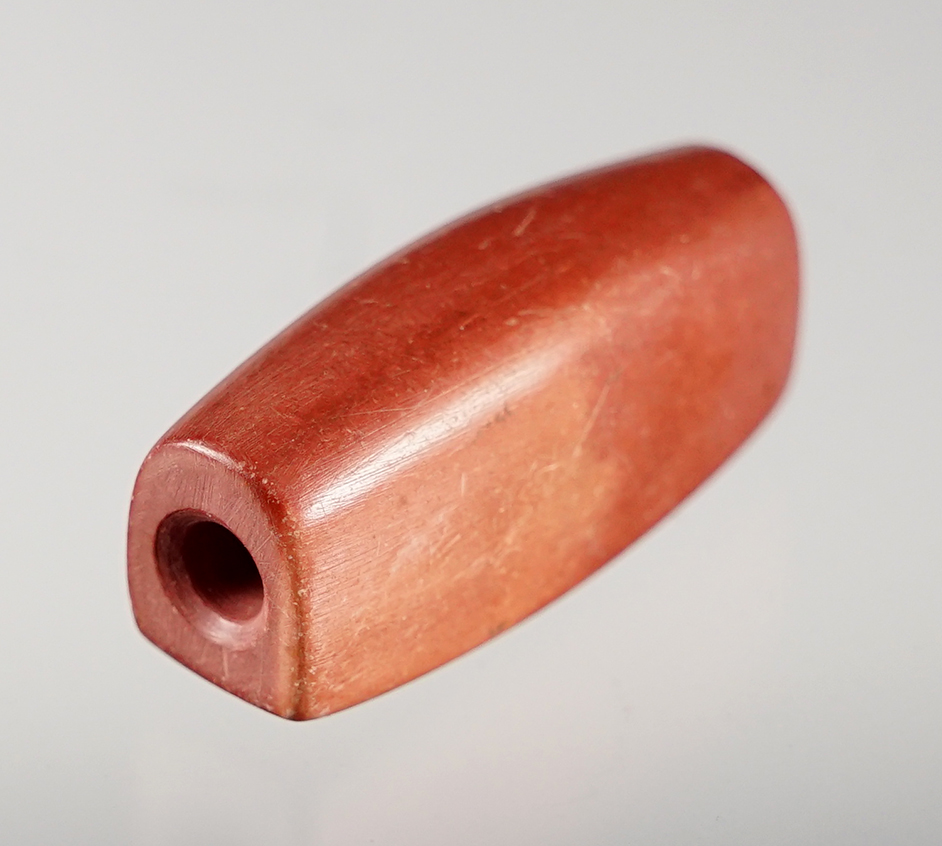 Well patinated 1 1/2" Catlinite Drilled Tube Pendant found in the Midwestern U.S. Bennett COA.