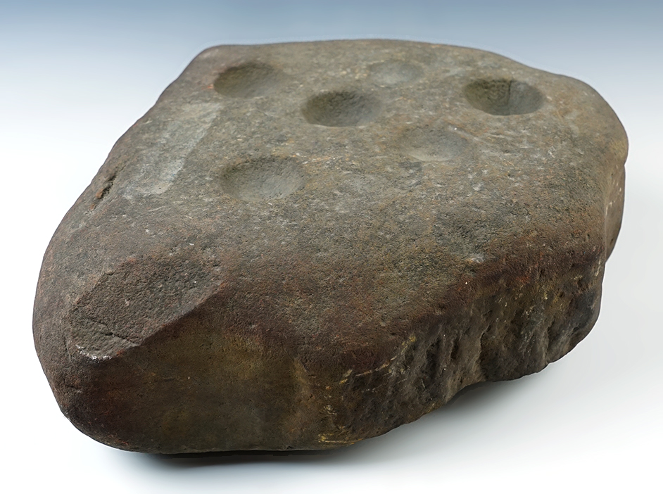 9" x 9 1/2" Nutting Stone with 6 divits found in Chillicothe, Ohio. In very nice condition. 