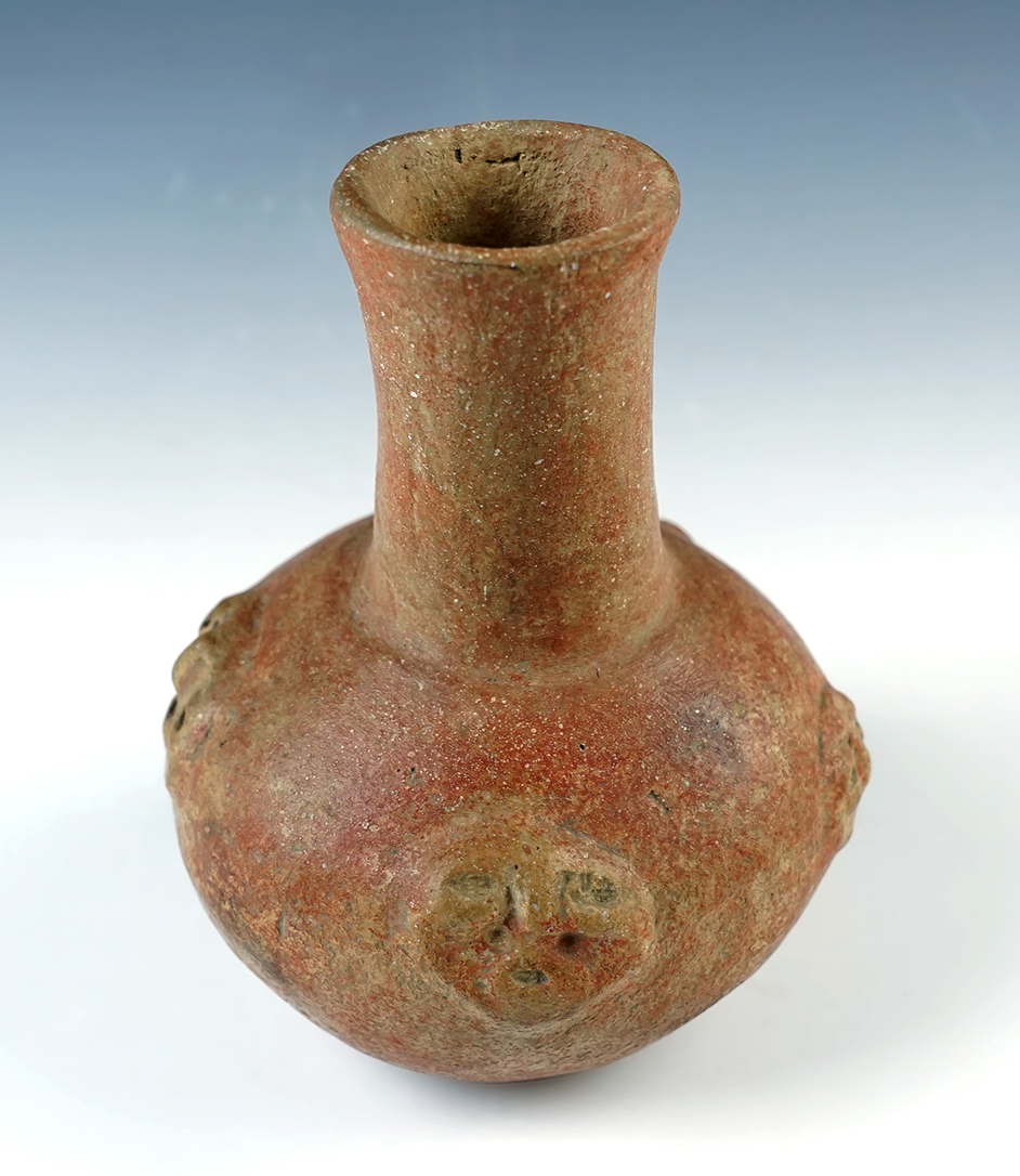 4 3/4" tall x 4 1/8" wide Mississippian Face Medallion Water Bottle. Found in Arkansas.  