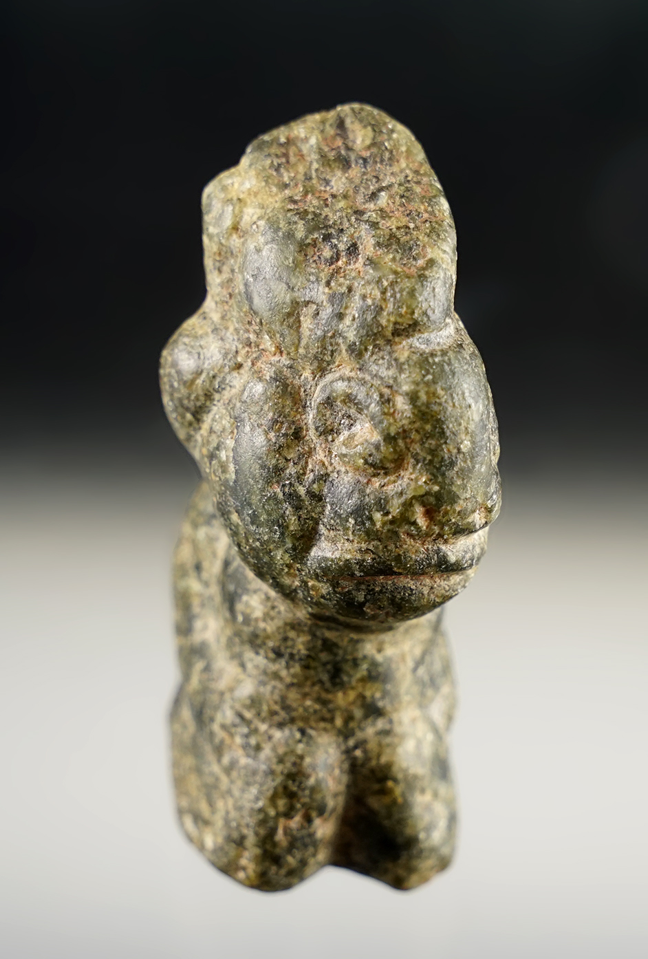 2 1/2" tall Human Effigy figure made from dense green Hardstone. Recovered in Mesoamerica.