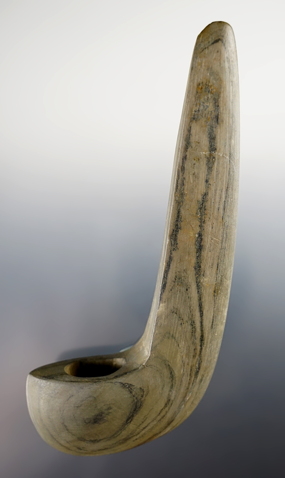 5 1/2" Geniculate Bannerstone found in Marion Co., Ohio. Part of lower section by hole is restored.