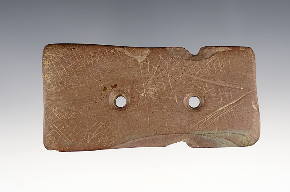 3 11/16" Gorget that is heavily engraved and made from red Slate. Found in Seneca Co., Ohio. 