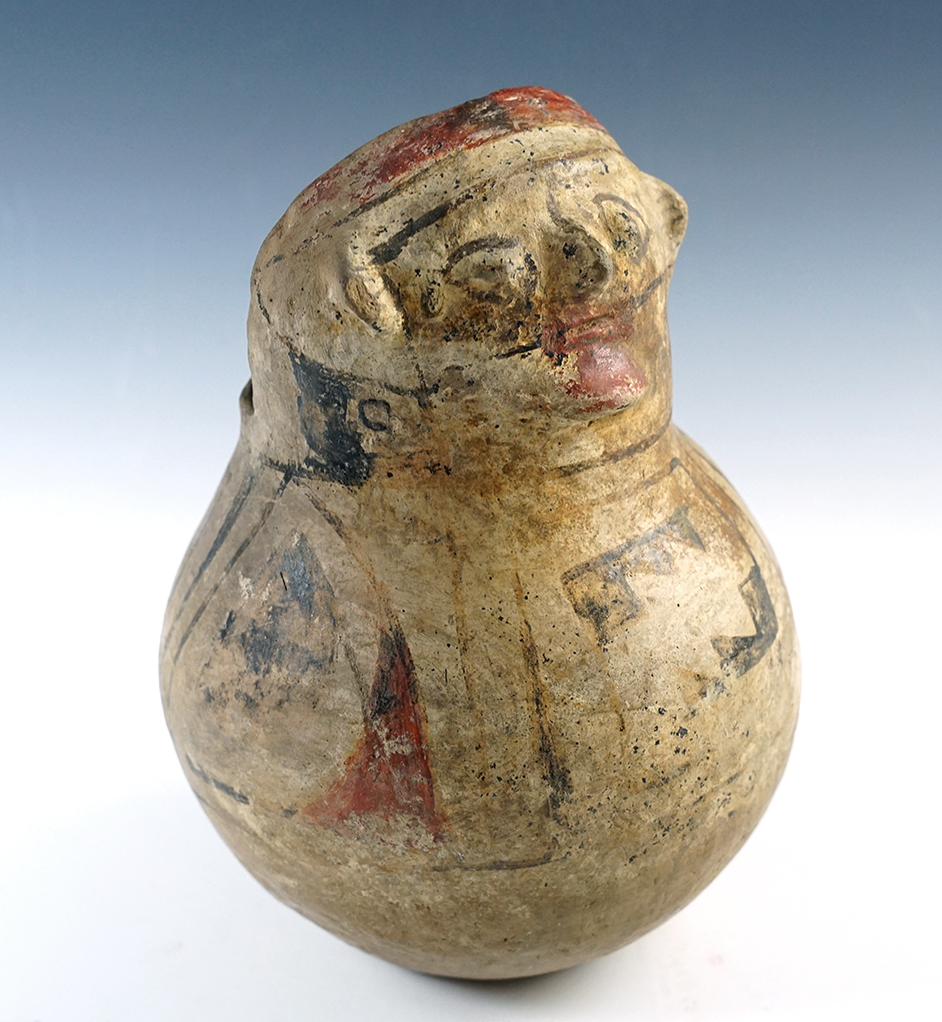 8 3/8" tall x 6" wide Casas Grandes Human Effigy Polychrome Jar, New Mexico. Pictured. COA.