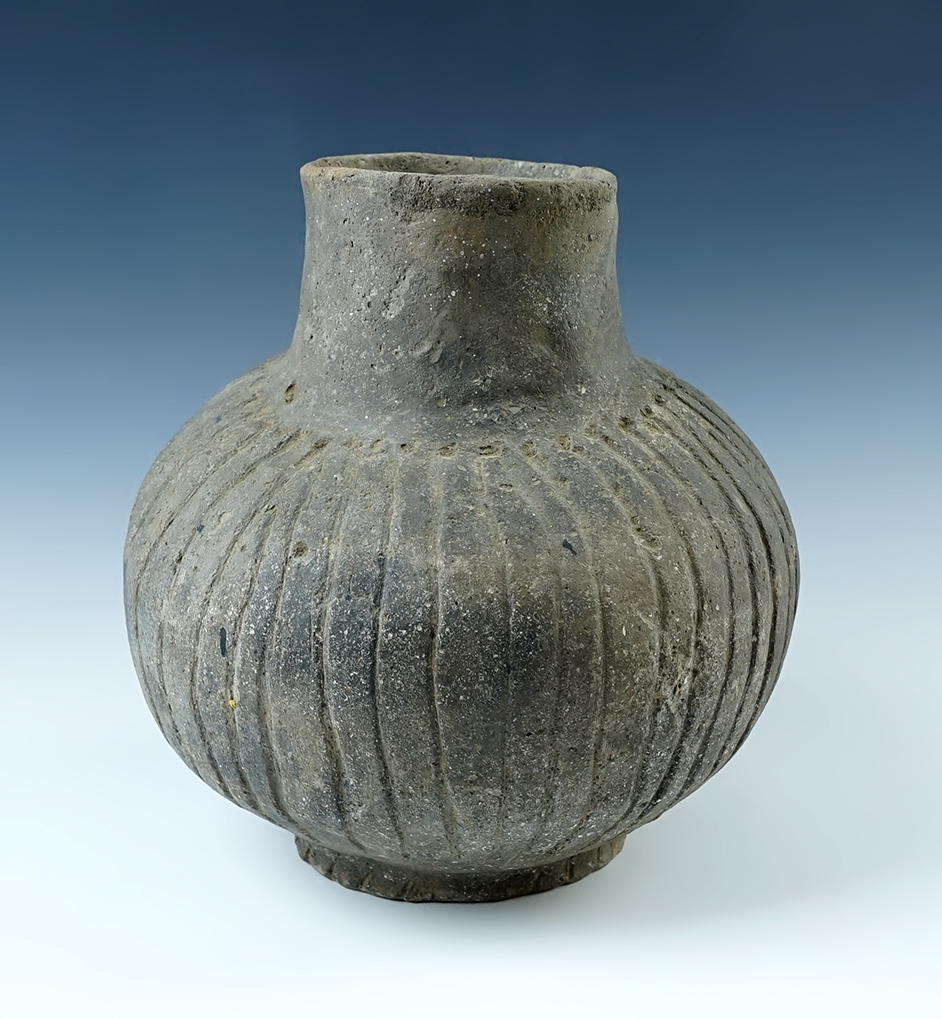 7 3/4" tall x 7" wide Mississippian Melon-stripe Incised Pedestal Based Bottle, Arkansas. 