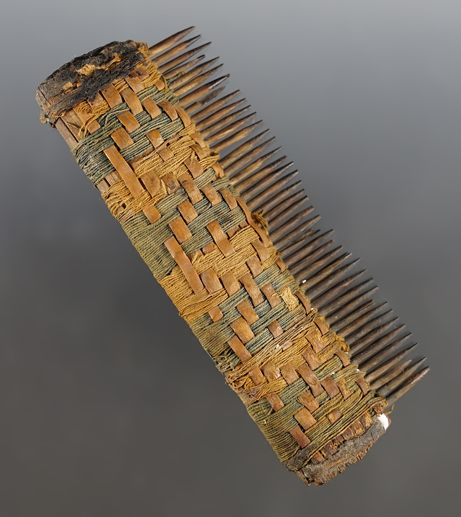 Original 3 7/8" Inca Wood Hair Comb with a woven handle. Recovered in South America.