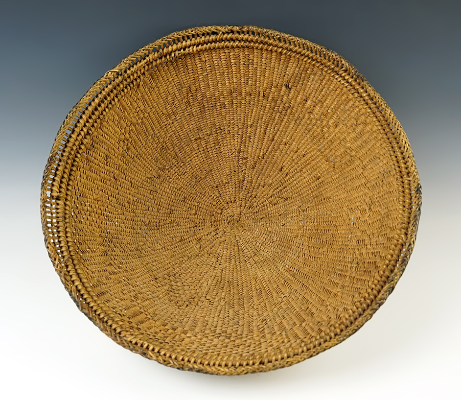 13" wide x 4" tall Vintage Basket that is tightly woven with nice exterior paint. Very good condition.