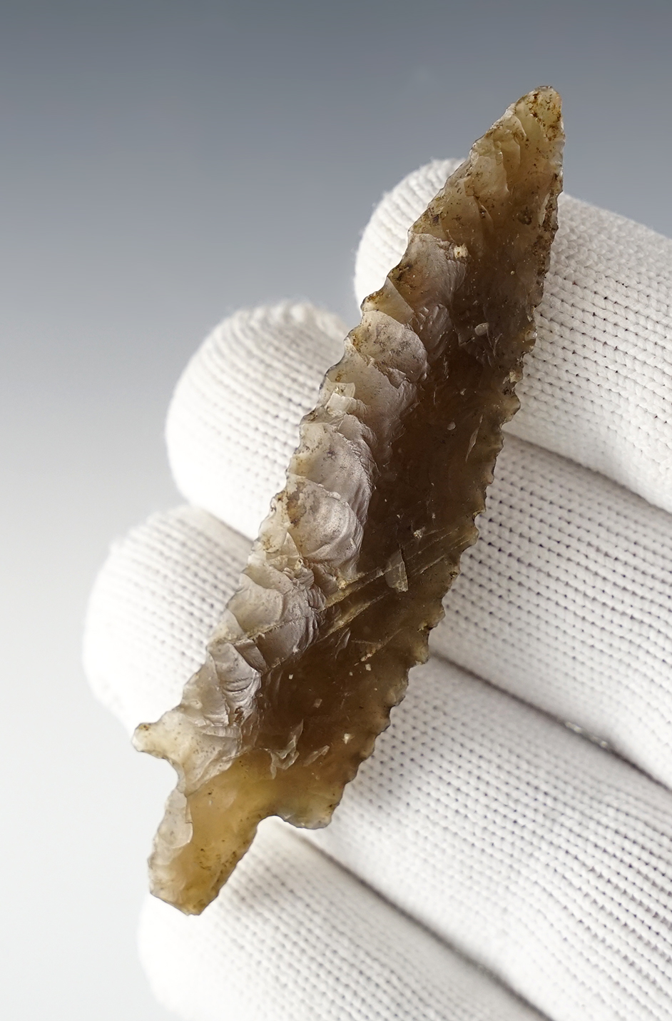 Exceptional flaking on this 3 1/8" Bear point made from patinated Chalcedony. Alaska.