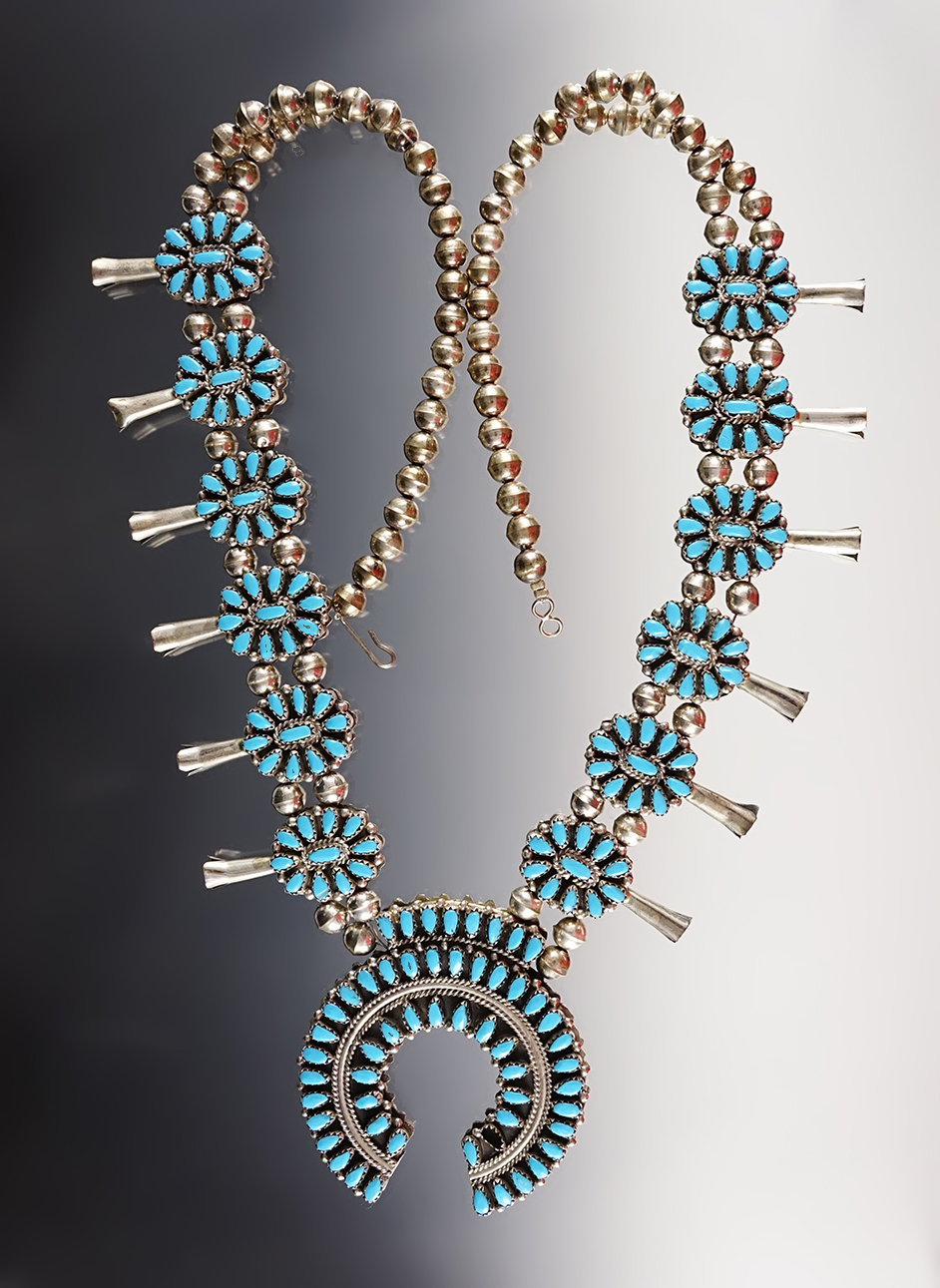 Attractive contemporary Squash-Blossom Necklace that is 14" long.