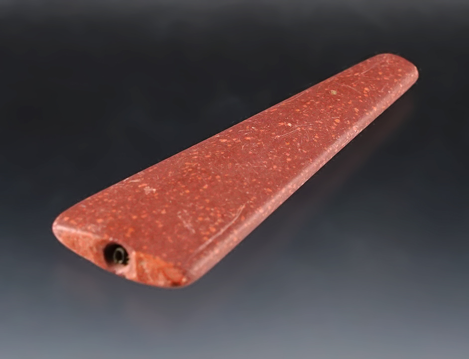 2 5/8" Trapezoidal bead with original brass wire still remaining in hole. Geneva, New York. 