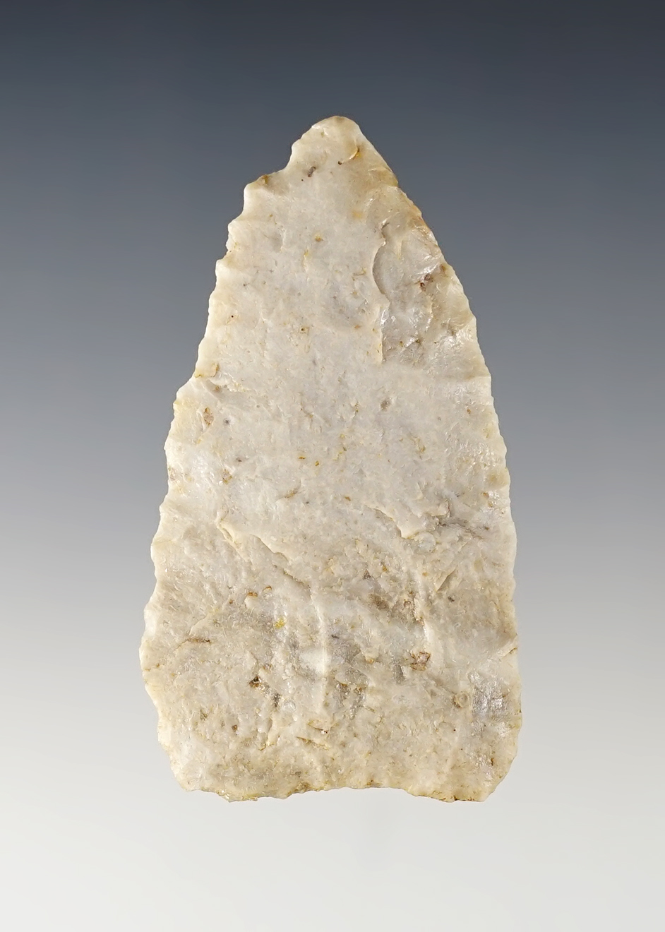 Nicely made 2 1/2" Paleo Knife with ground lower edges. Found in Tulsa Co., Oklahoma.