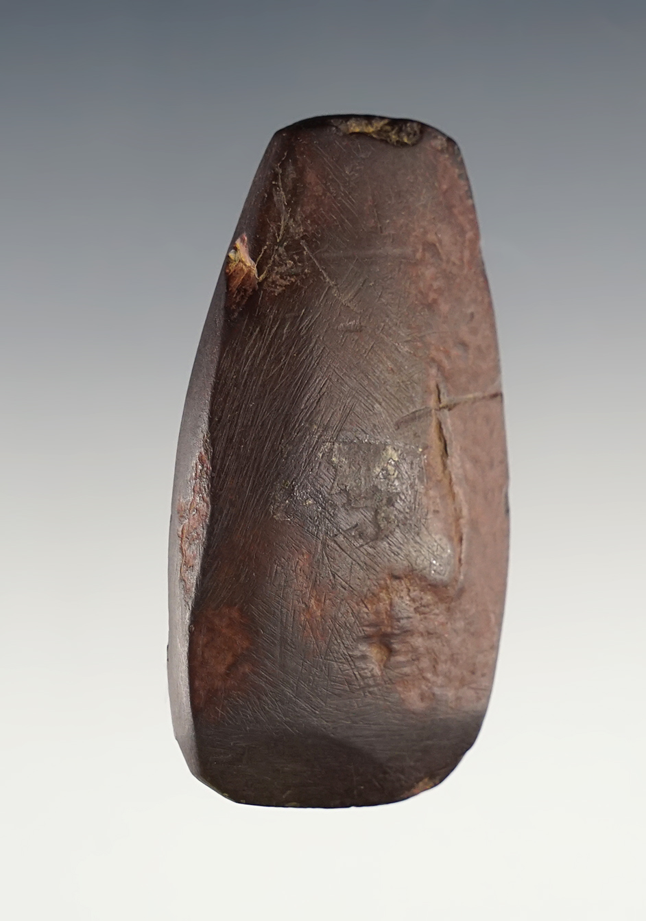 2 3/8" x 1 3/16" Celt made of reddish-brown Hematite. Great form and condition. Ohio.