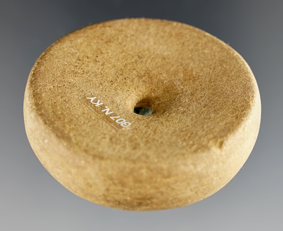 Fine 1 7/8" perforated Sandstone Discoidal found at the Fox Field Site, Mason Co., Kentucky.