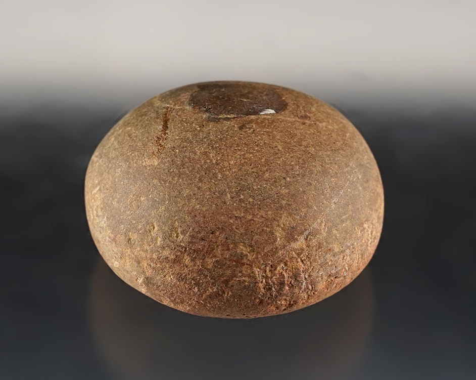 1 5/8" x 15/16" Cone that is flat on the bottom and one side. Found in Ross Co., Ohio