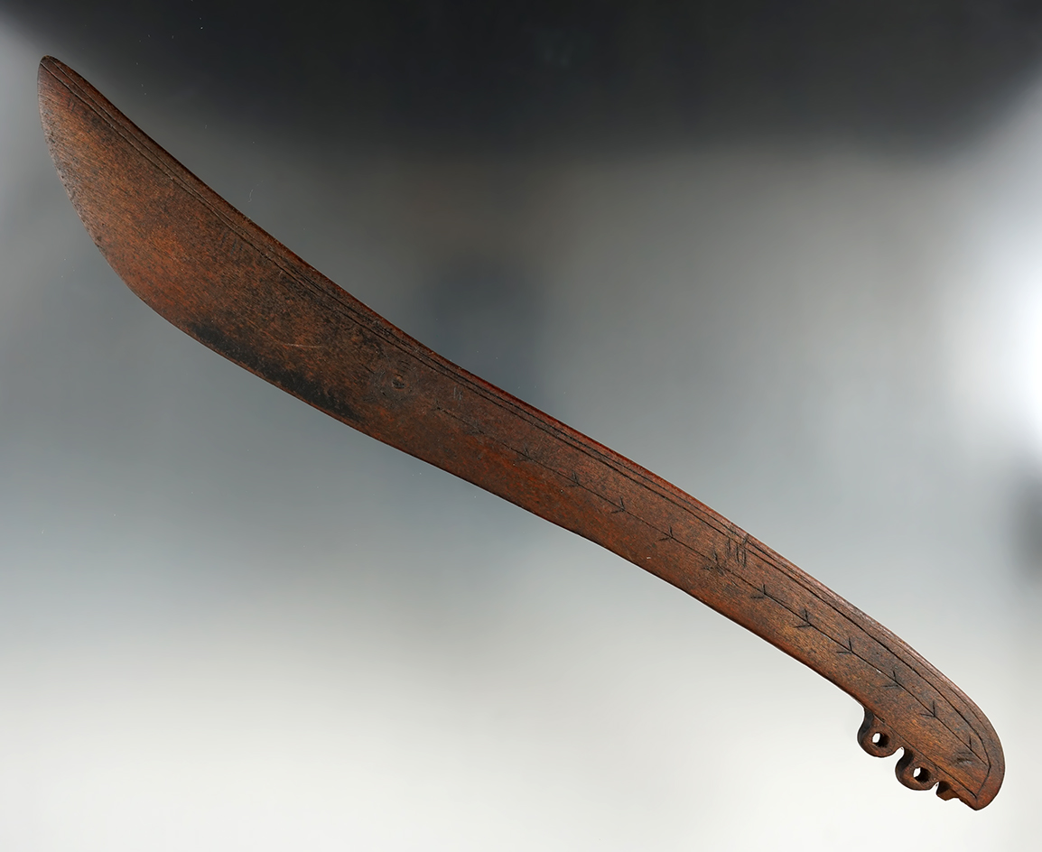 Nicely styled 11 7/8" long Alaskan snow knife with nice incised line carved design.