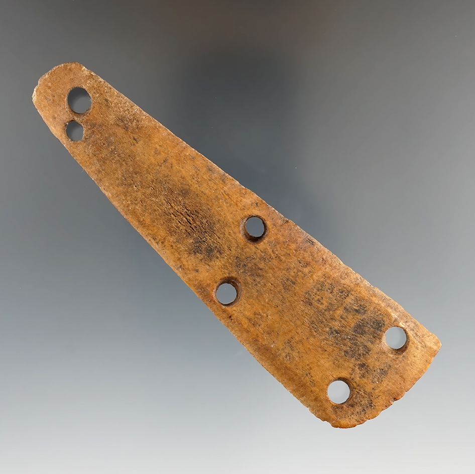 4 3/8" Perforated Bone Armor Section found in Alaska. Comes with a Bennett COA.