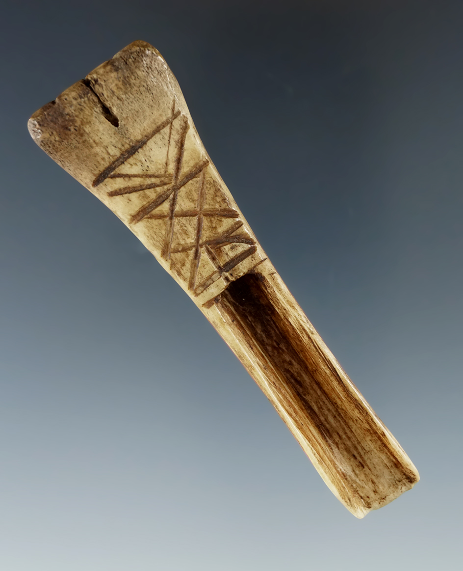 Intricate carving on this 2 15/16" Bone Gouge found at the Ames site. Ex. Howdy Lang.