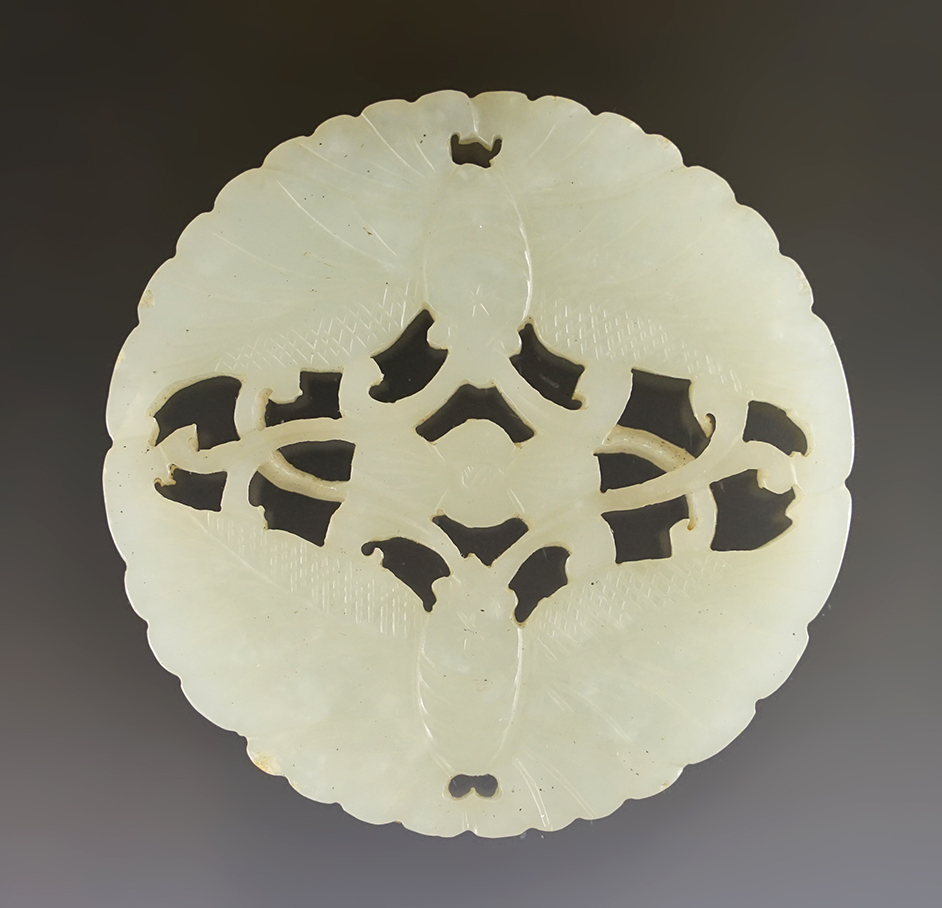 Vintage 2 3/8" Chinese Jade Disc that is finely carved. Southeast Asia. Exact age unknown.
