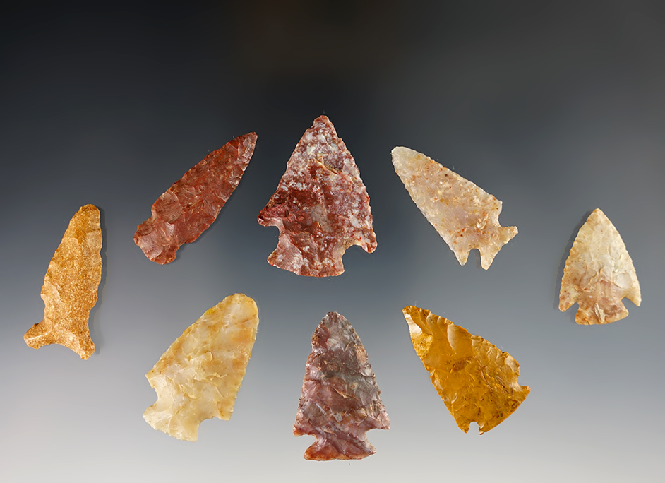 Set of 8 nice Kansas points made from colorful  materials. The largest is 1 1/2".