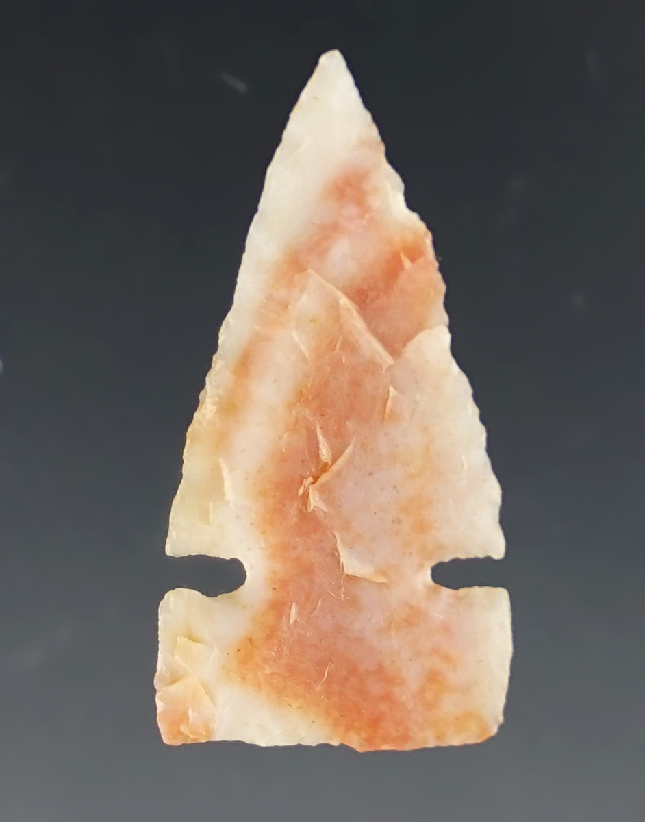 1 1/8" nicely styled Micro-Notch/Sidenotch point made from colorful Alibates. Found in Kansas.