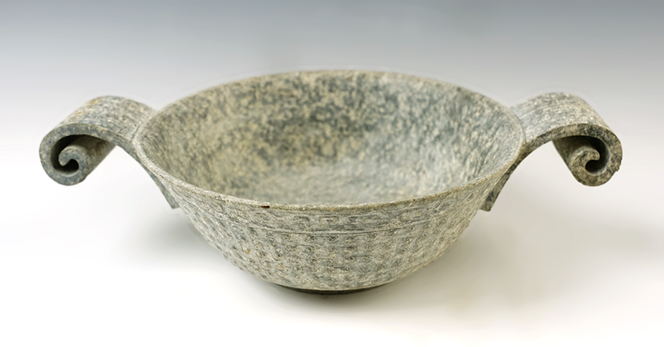 Excellent artistic design on this 7 1/2" x 2" handled Stone Bowl with a pedestal Base. Asia.