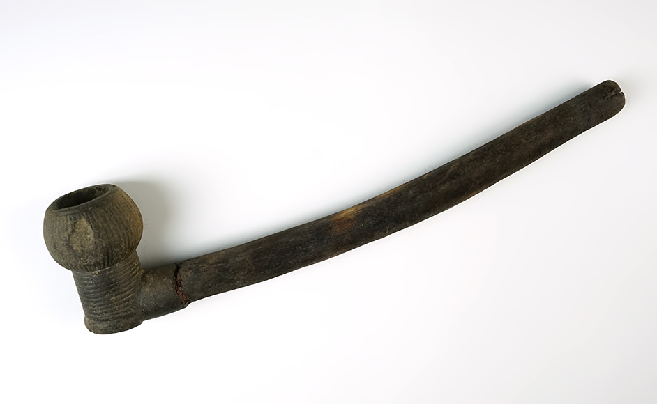 Vintage Arabic pipe with original wood stem. 12 3/4".