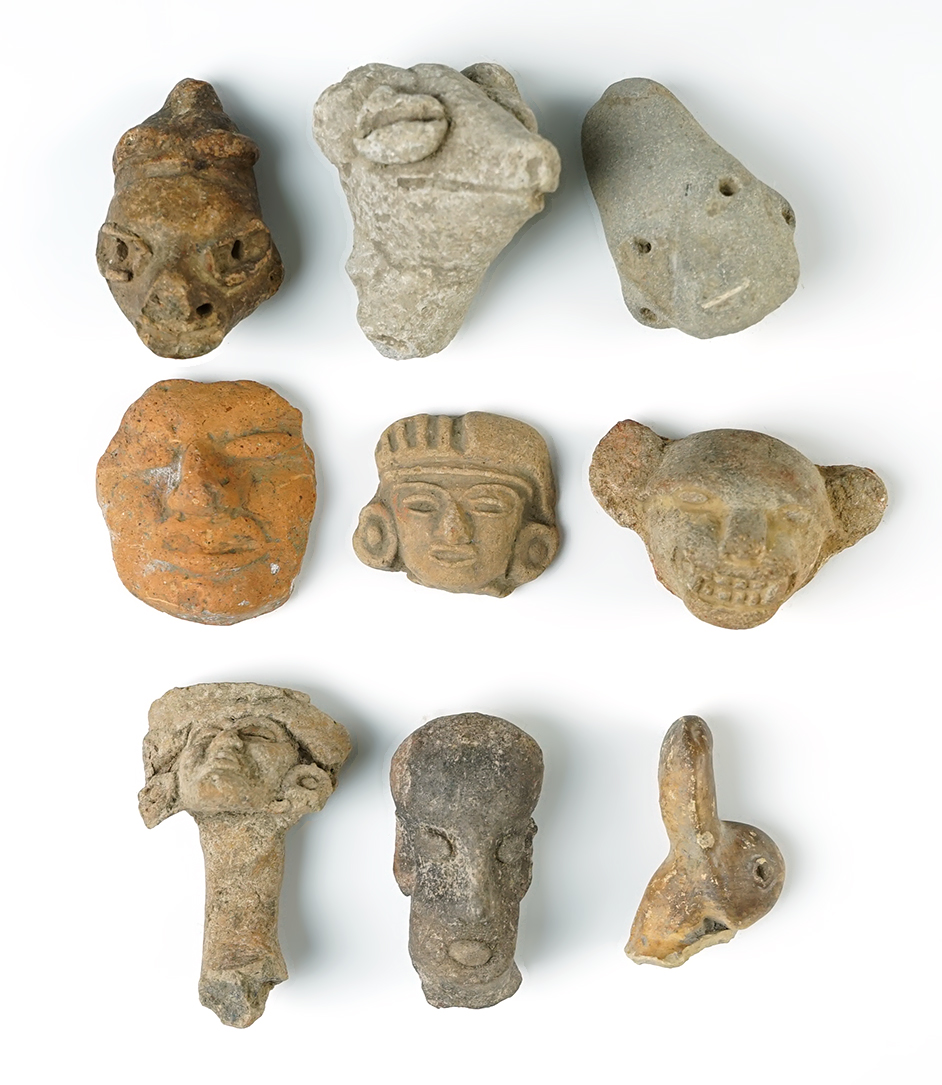 Set of 9 Pre-Columbian Pottery Heads found in Mexico. The largest is 2 7/16".