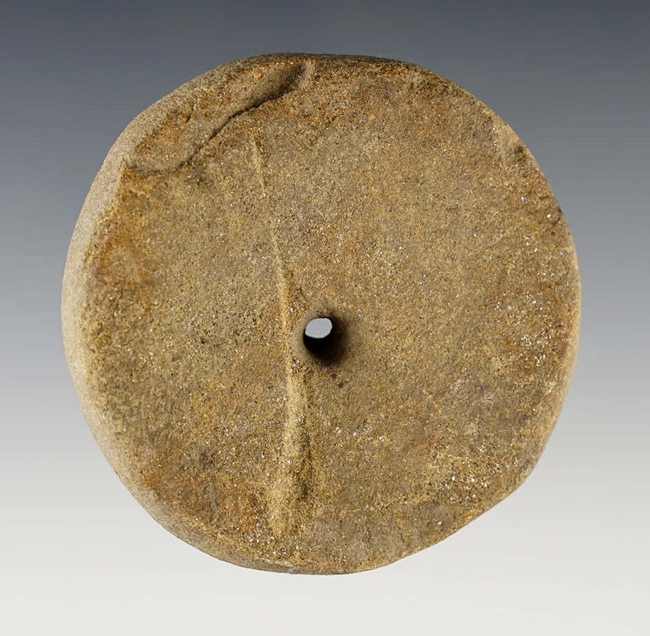 2 1/2" diameter Sandstone perforated Discoidal. Found in Liberty Twp., Hardin Co., Ohio.