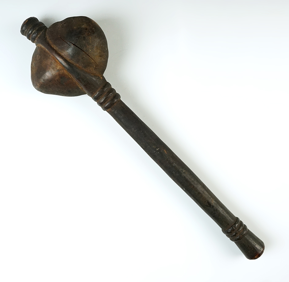Decorative vintage wooden club most likely from Africa or the Islands.