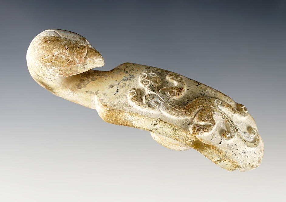 3 13/16" heavily patinated avian effigy jade buckle. In very nice condition.