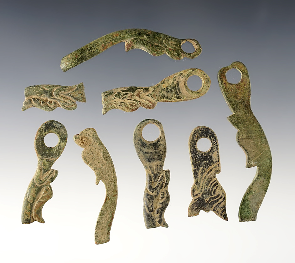 Set of 8 Serpent Side Plate Heads from early 18th century Trade Guns. Geneva, New York. 