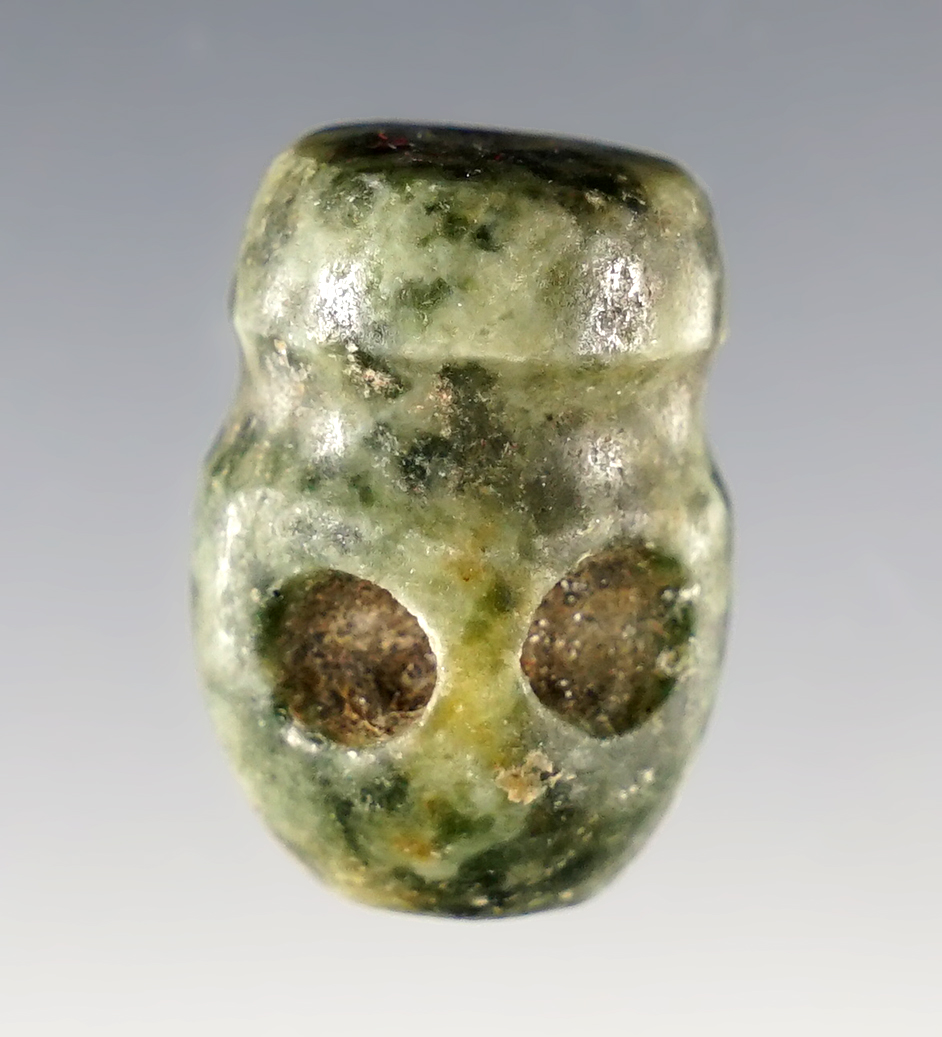 15/16" Plug-shaped bead, possibly Mixtec, Mexico, 900-1400 CE. 