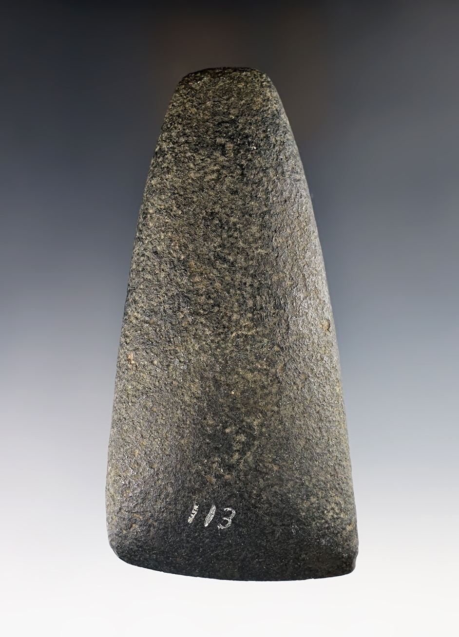 4 3/4" Hardstone Celt with a very impressive polish to bit and great patina. Recovered in the Illinois area.