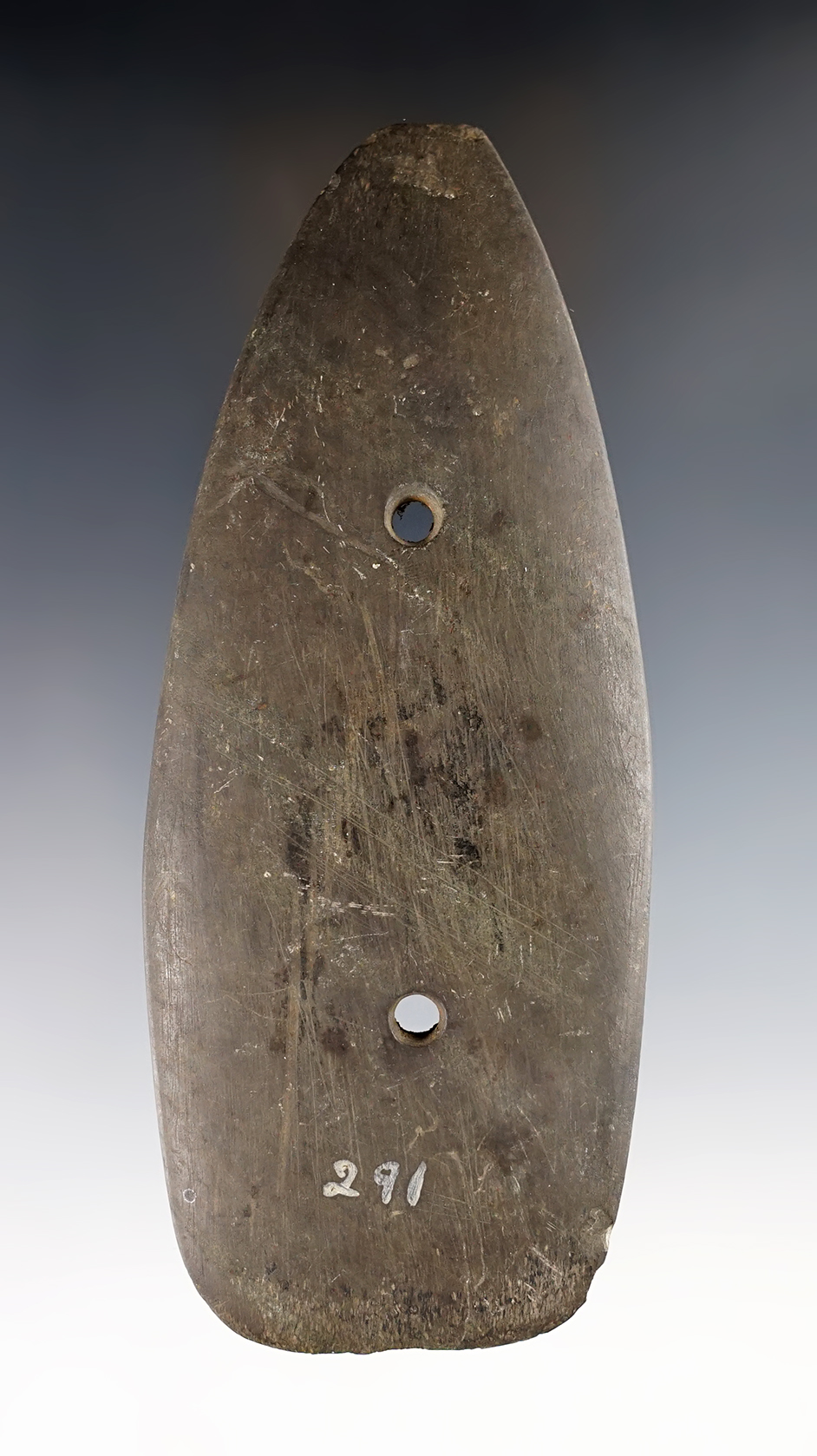 5 3/8" Slate Gorget that is heavily patinated with a couple of nicks. Found in the Ohio area. 