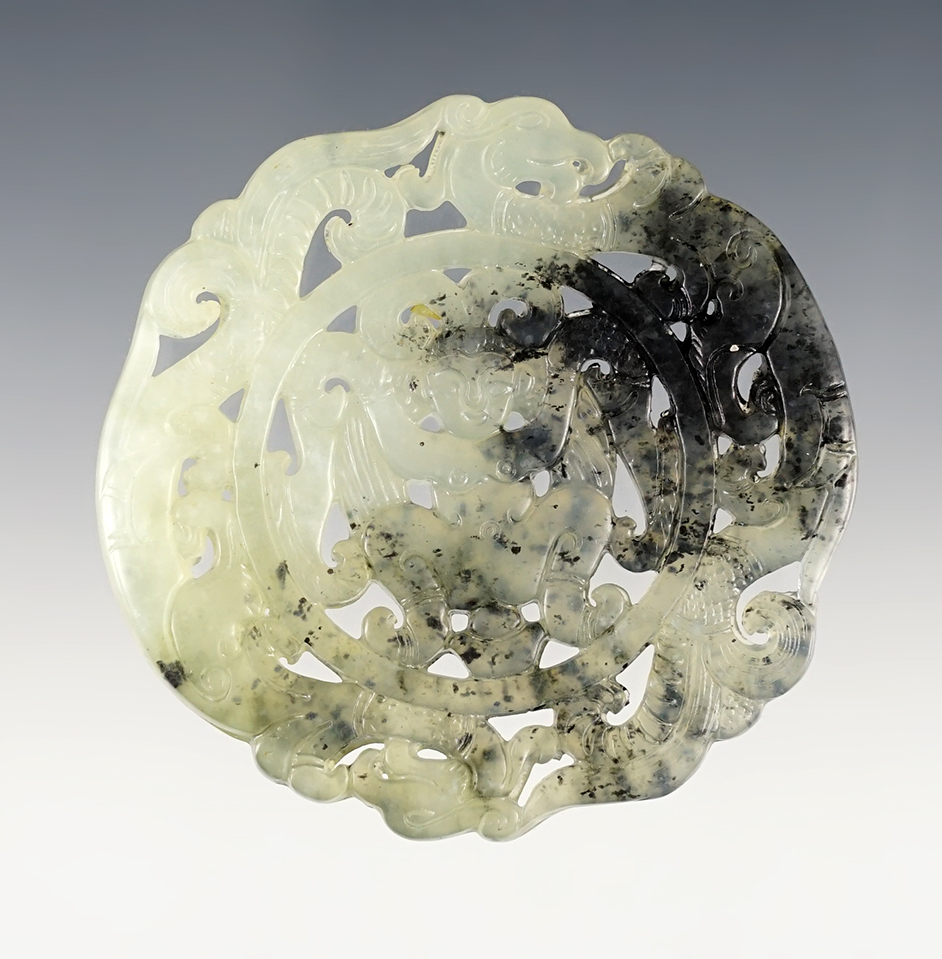 2 3/4" beautifully carved Jade Disc in excellent condition. Southeast Asia. Exact age unknown. 