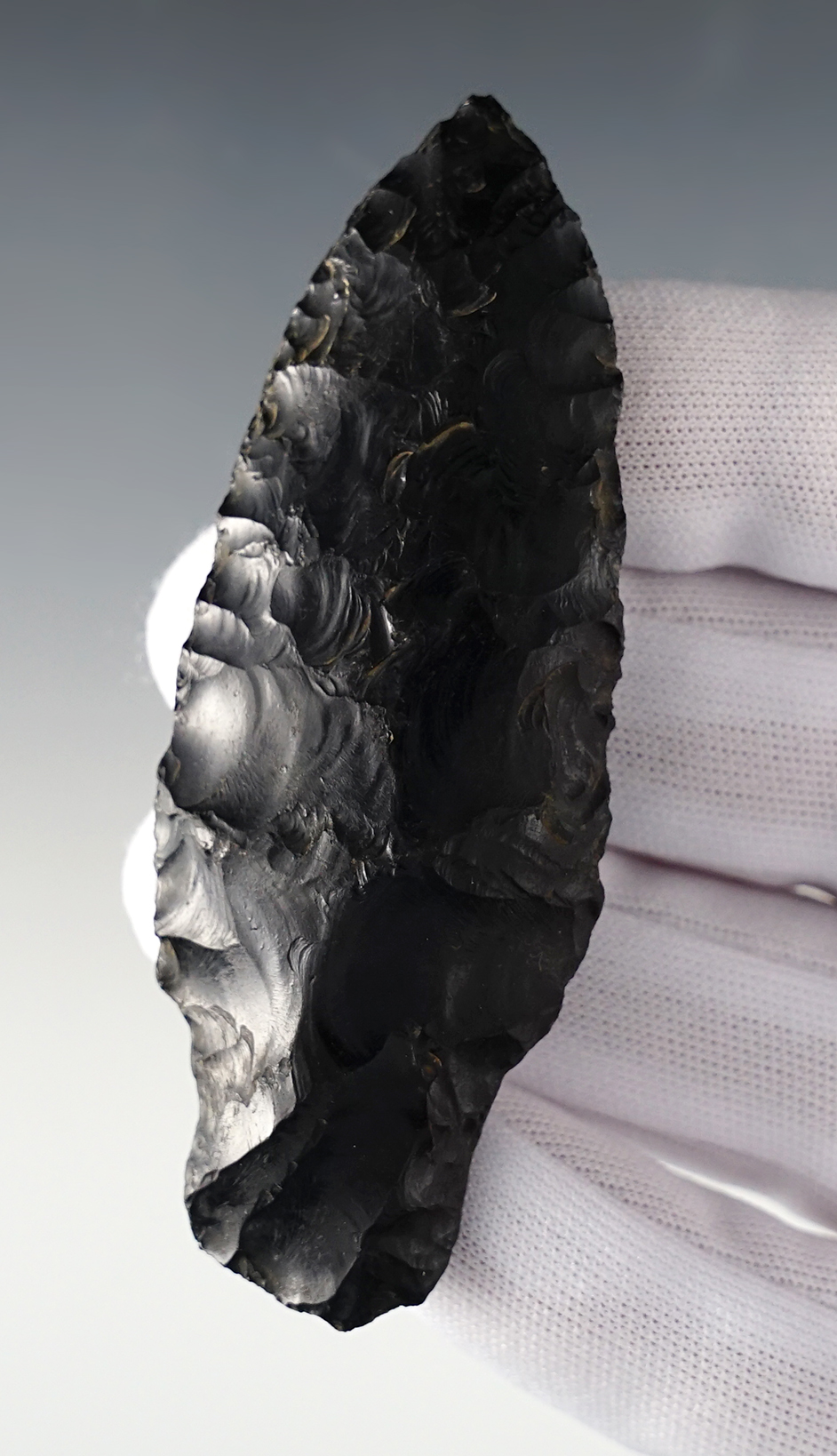 3 5/16" Parman made from patinated Obsidian. Found in Union Co., Oregon. Davis COA, G-8.