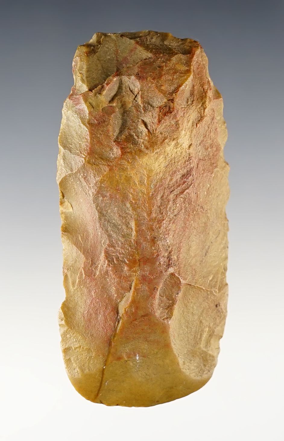3 1/4" Celt made from tan Flint. Found in Montgomery Co., Kentucky.