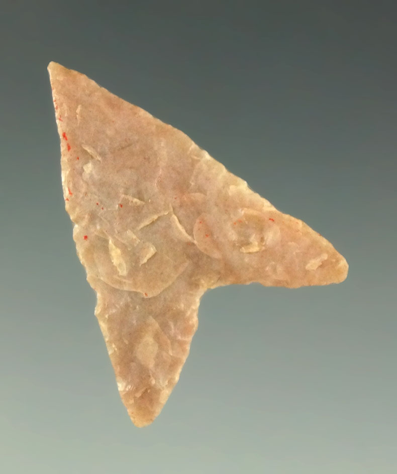 1 3/16" Starr point made from attractive pink material found in Texas. Ex. Charles Shewey.