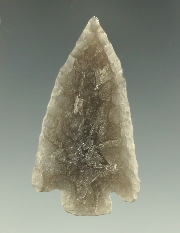 1 1/2" Eastgate that is thin and nicely made from obsidian which is well patinated. Oregon.