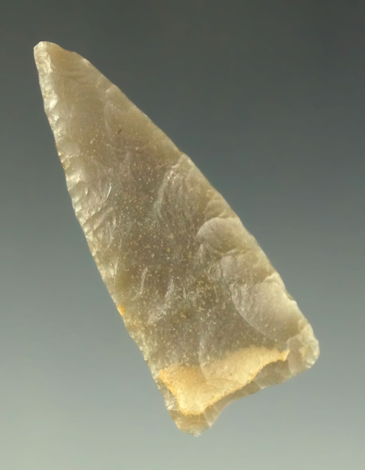 1 5/8" Fort Ancient Triangular arrowhead found in Kentucky that is nicely patinated.
