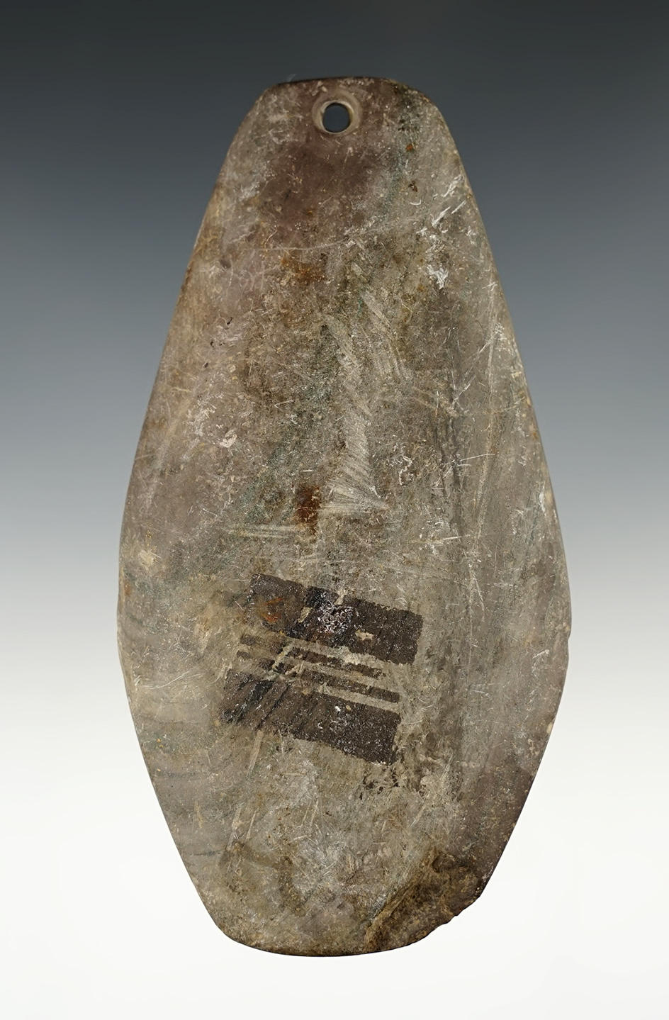 4 5/8" Slate Pendant that is well patinated. Found in the Midwestern U.S.