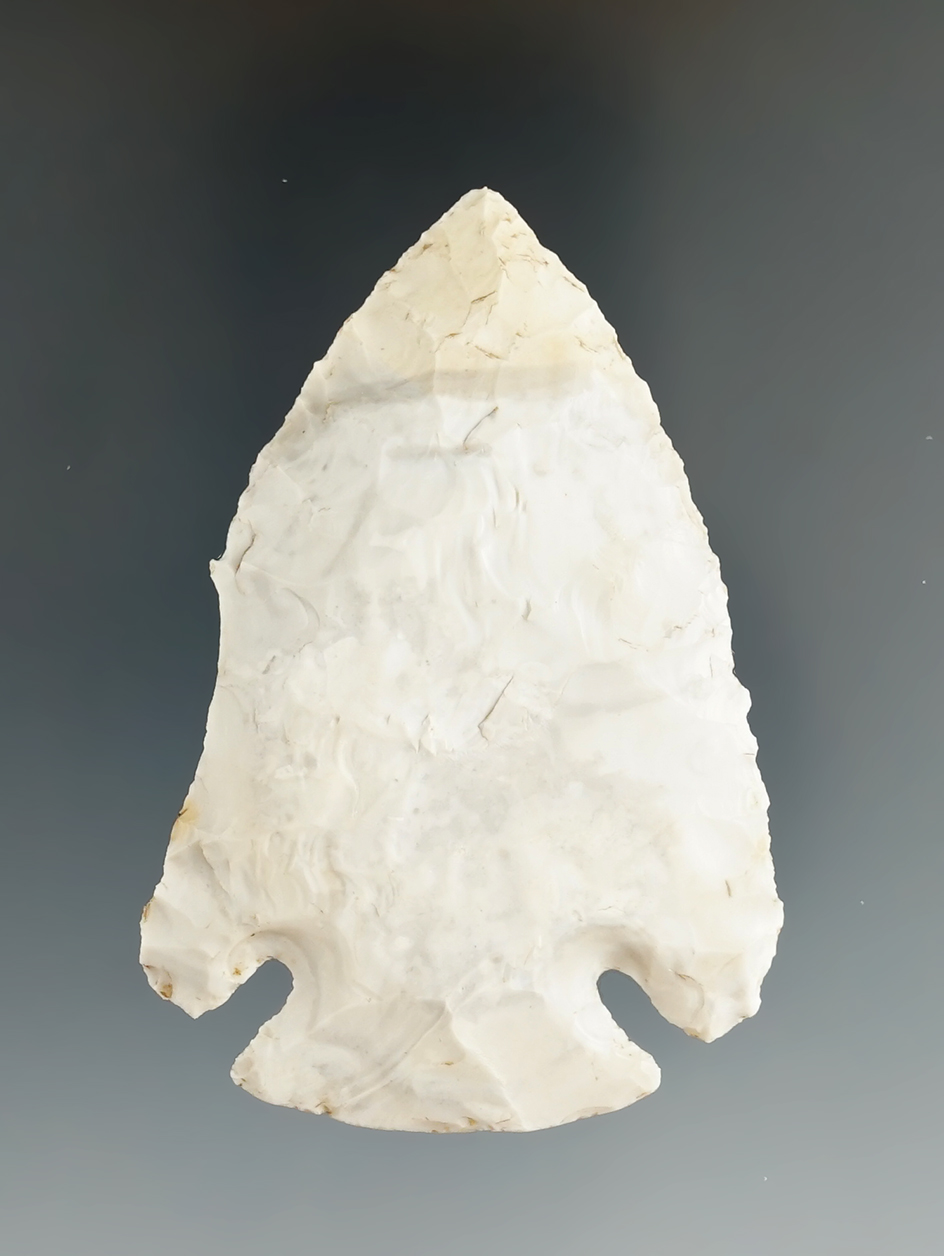 2 1/2" Archaic Cornernotch with unique spoke shave on one Blade edge found in Missouri.