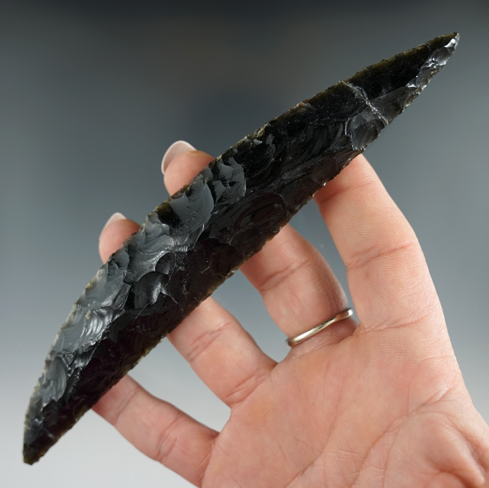6 1/4" obsidian bi-pointed pre-Columbian crescent Knife that is broken and glued in several places.