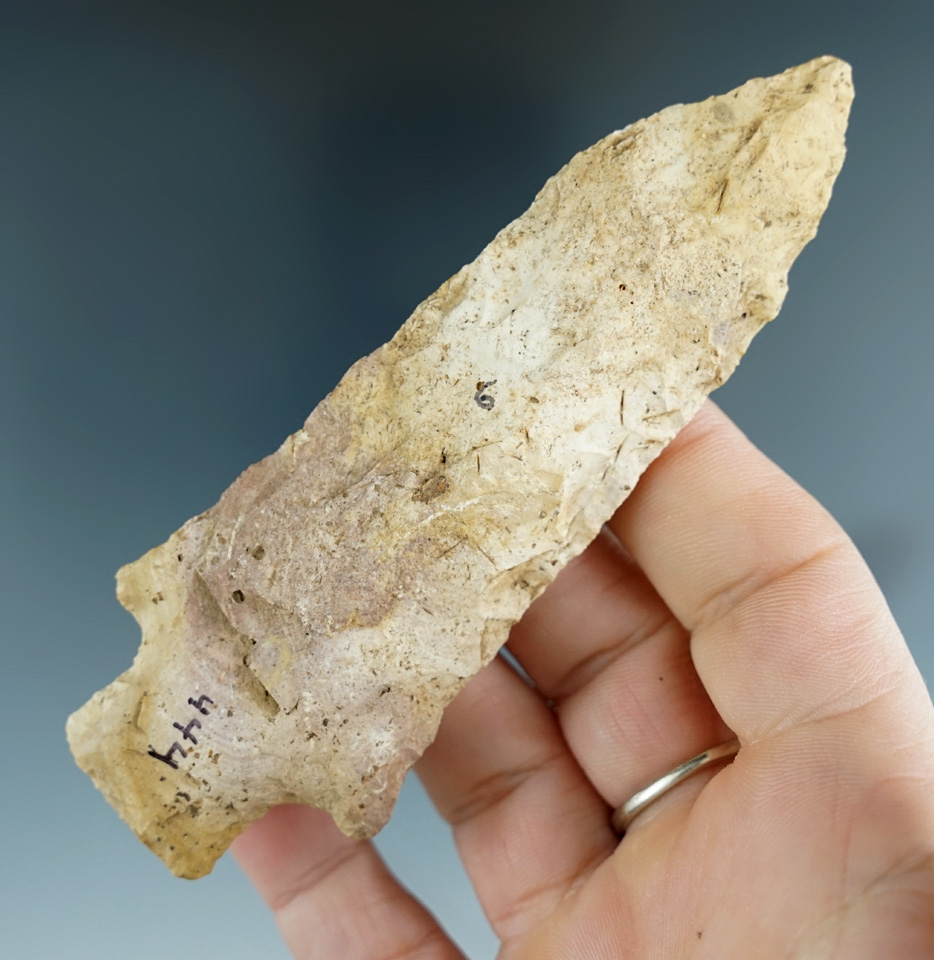 4 5/16" Etley Knife with heavy mineral deposits on surface found in Missouri.