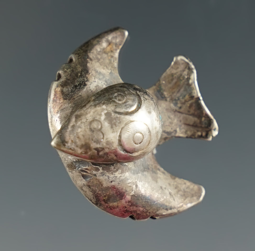 1" wide beautifully crafted pre-Columbian avian effigy made from silver found in Peru.