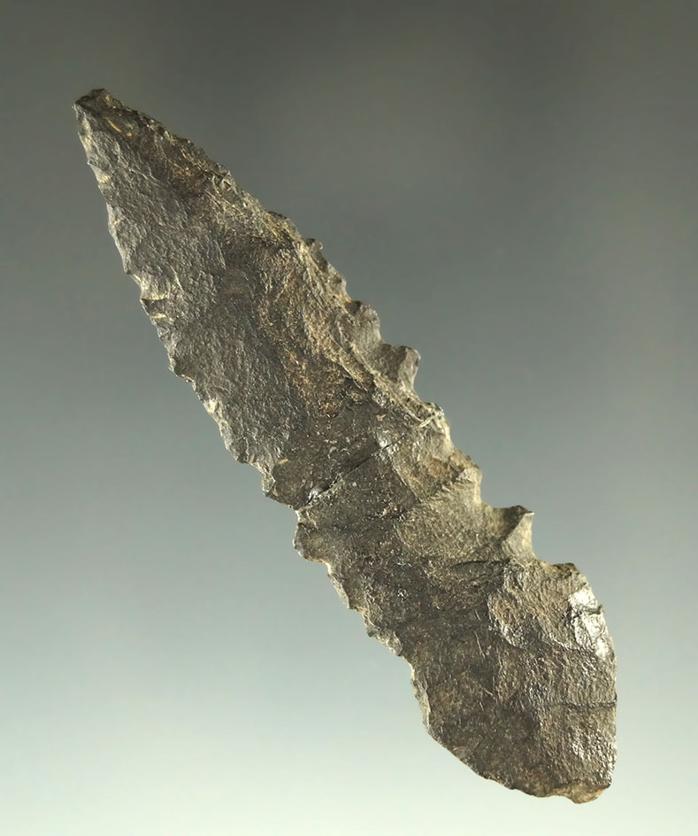 Uniquely styled 2 1/2" serrated Basalt Knife that is broken and glued at the mid section - Oregon.