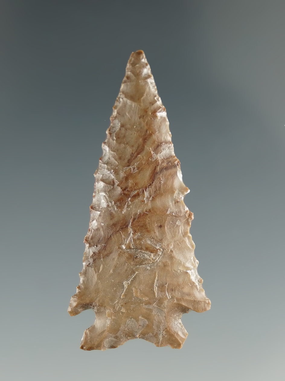 1 5/8" Snake River Serrated made from light brown Jasper. Found near the Columbia River, OR.